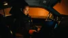 Police Officer in vehicle at night